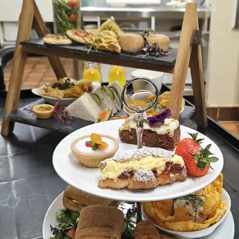 a table topped with plates of food on a plate