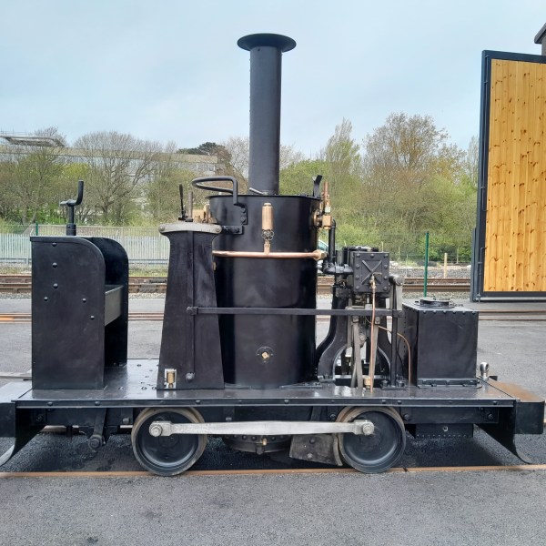 a box truck is parked in front of a building