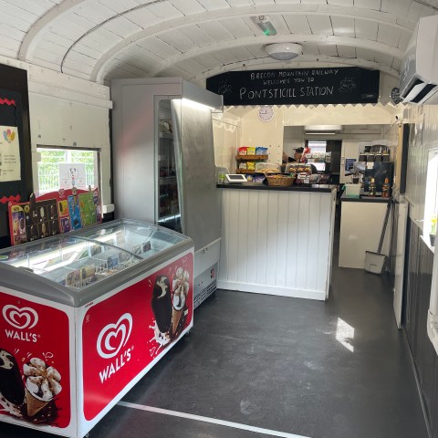 a room that has a sign on the side of a building