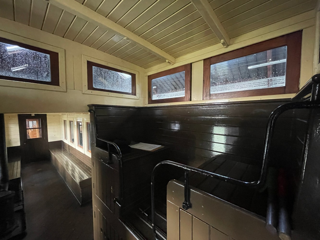 a room filled with furniture and a large window