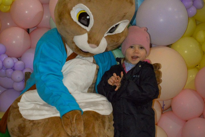 a group of teddy bears sitting on top of a pile of stuffed animals