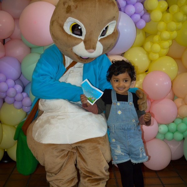 a group of teddy bears sitting on top of a pile of stuffed animals