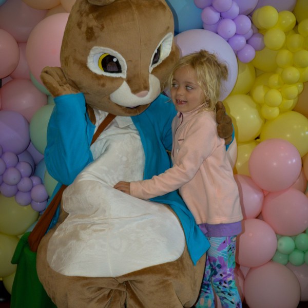 a group of teddy bears sitting on top of a pile of stuffed animals